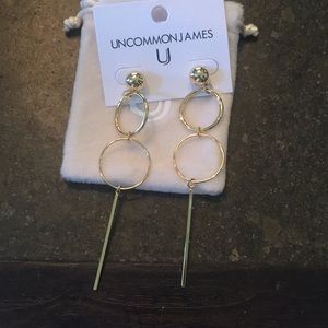 Uncommon James Baller earrings in gold.